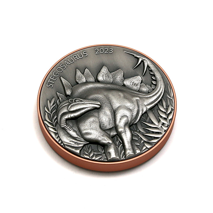 Bimetalová mince Obři světa Dinosaurů - Stegosaurus 2023 Antique Standard